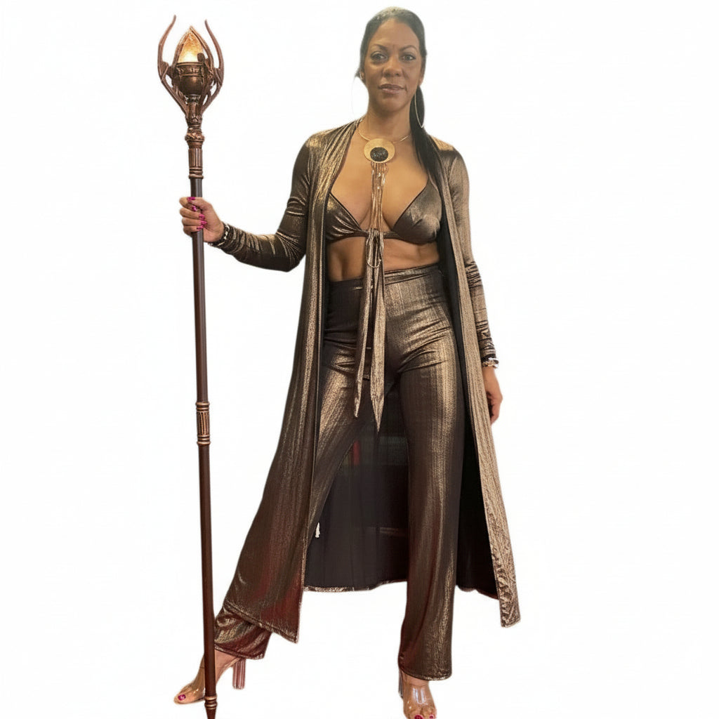 Woman wearing a metallic bronze outfit on a white background